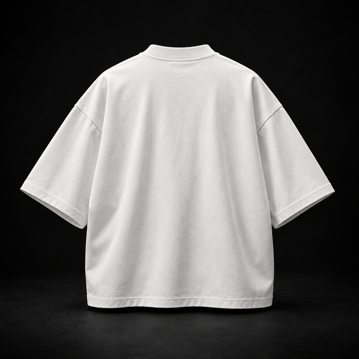BioBonds white boxy oversized tee back on black background
