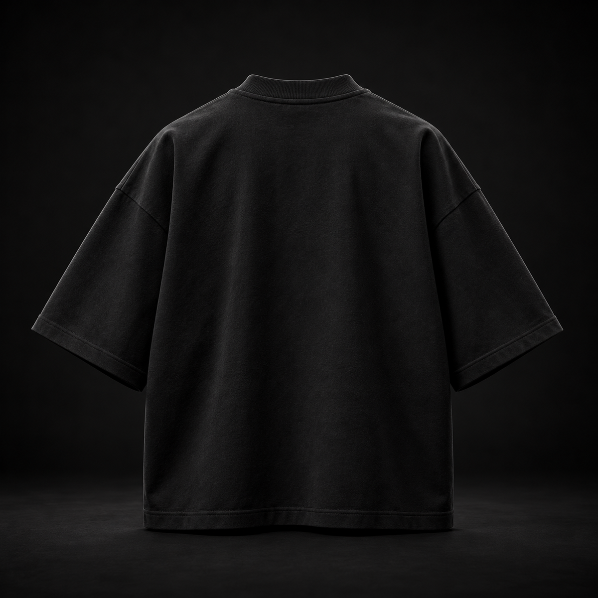 BioBonds black boxy oversized tee back on black background